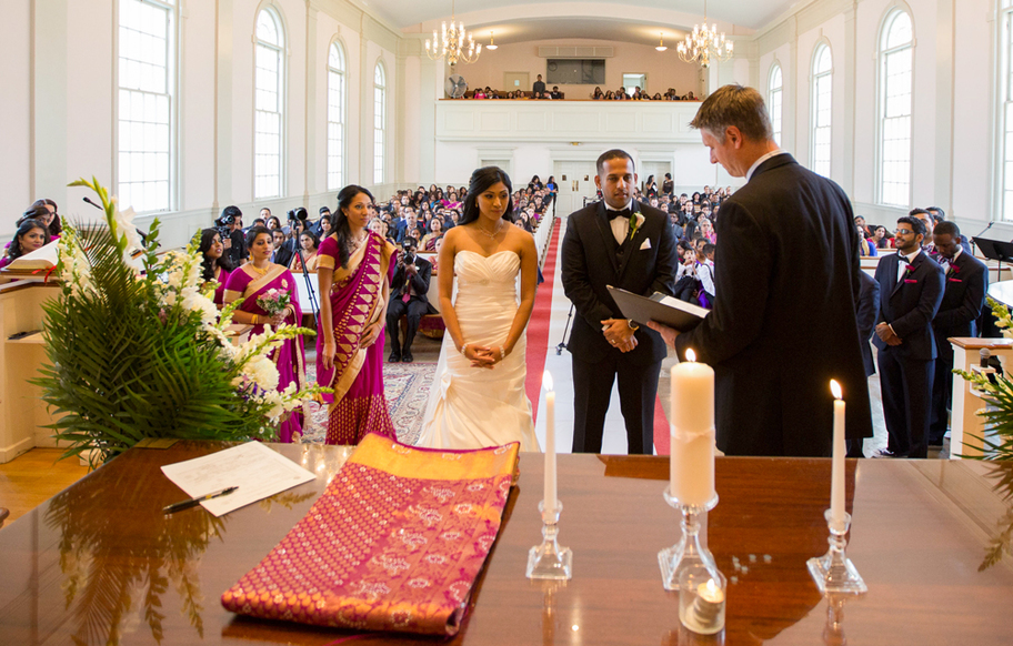 Photo of a wedding ceremony in the sanctuary at First Baptist