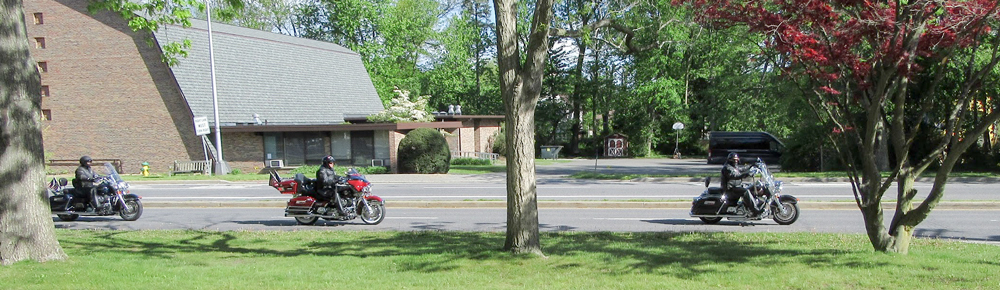 Photo three motorcyclists on North Street