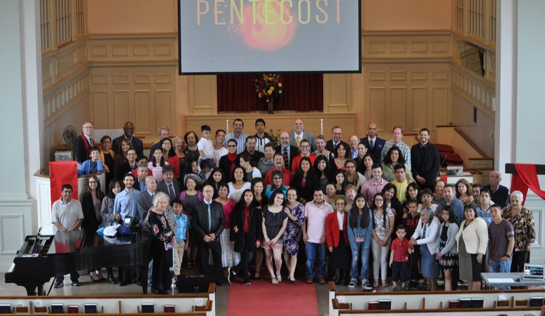 Group photo of church members at a joint Pentecost service with Iglesia Misión Bautista Hispana de Westchester and First Baptist Church of White Plains
